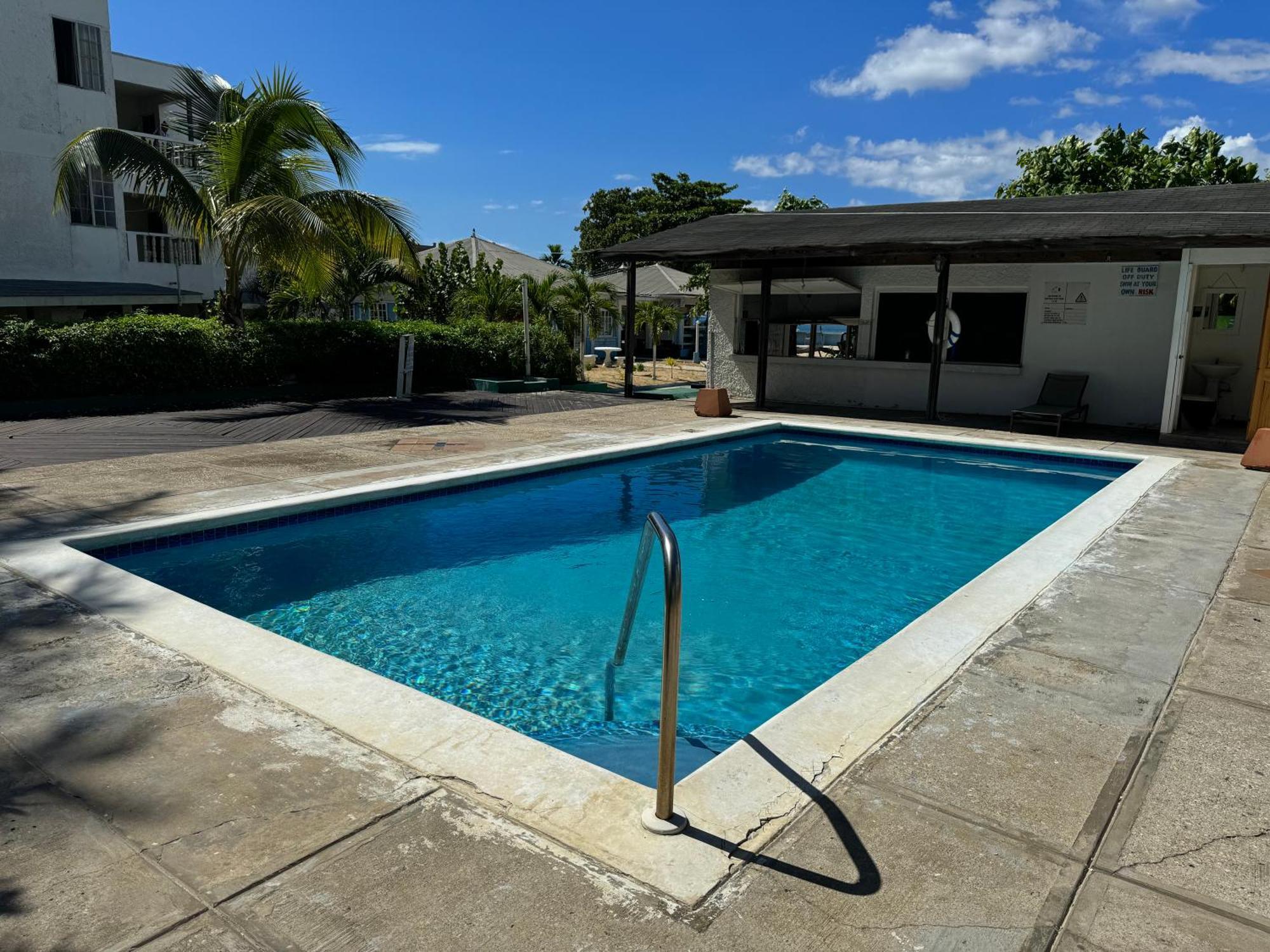 Marriott White Sands, Beachfront Condo At Negril Beach Club Экстерьер фото